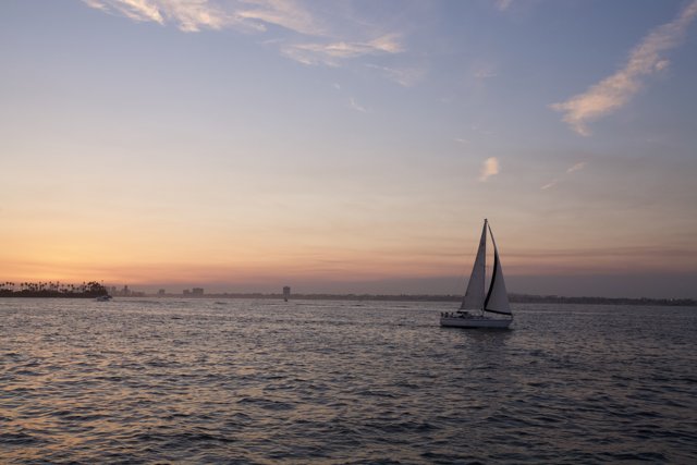 Serene Sailboat at Sunset