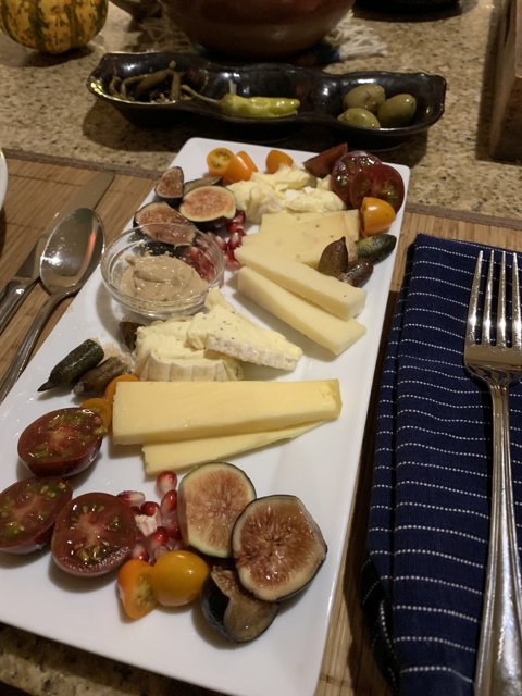 Cheese, Tomato, and Fig Antipasti Plate
