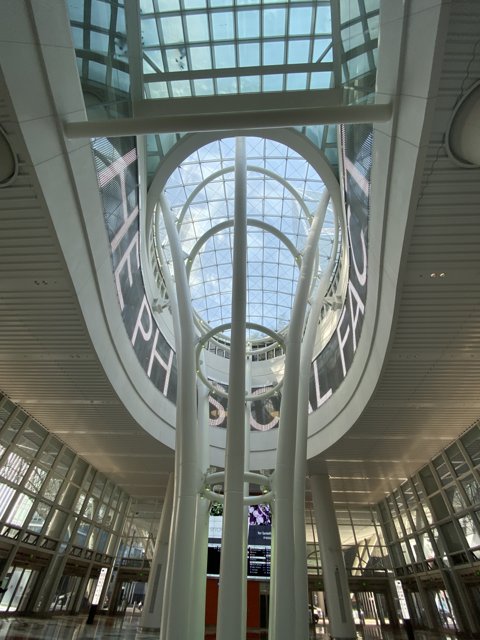 Glass ceiling adorned with a sign at Salesforce Transit Center