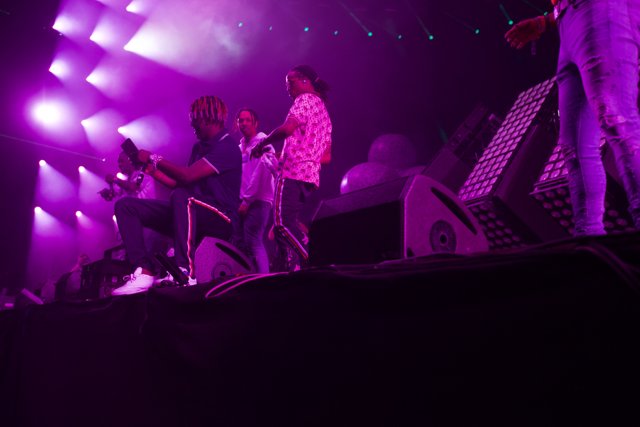 Purple Spotlight on the Stage