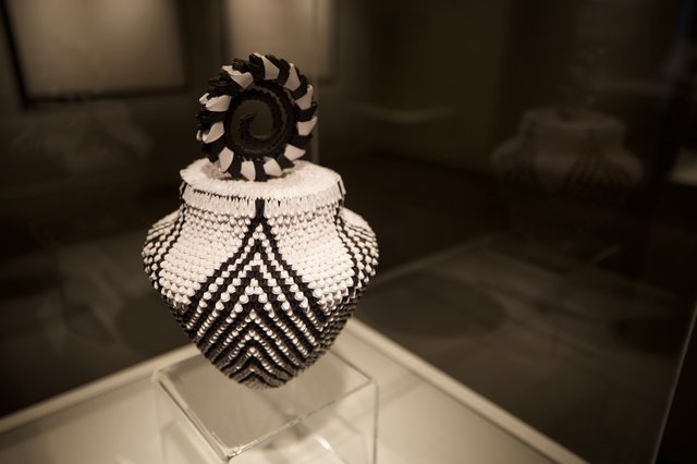 Traditional Native American Beaded Vessel with Geometric Patterns