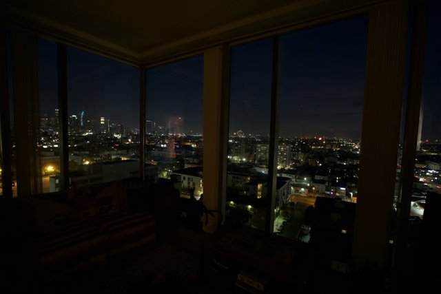 Nighttime Cityscape from a Penthouse Window