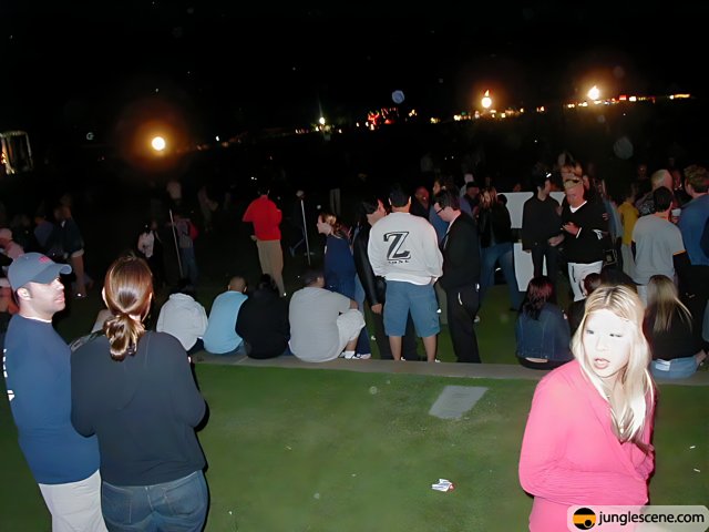 Nighttime Gathering on the Green