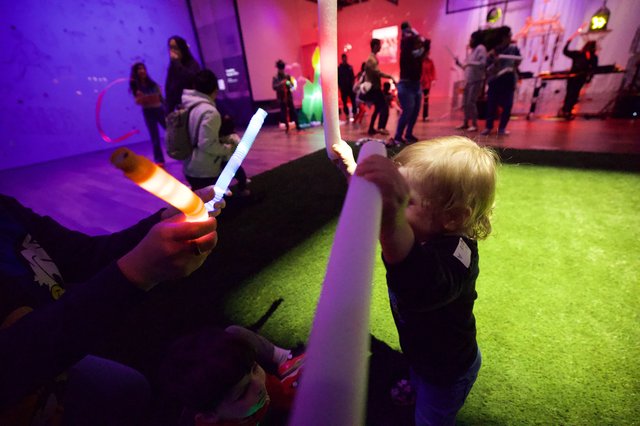 Child with Glow Stick at Baby Rave Event