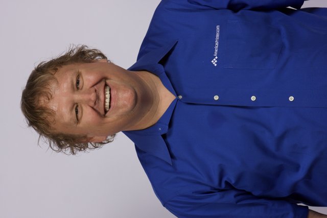 Smiling in Blue: Artie P in 2008 APC Office
