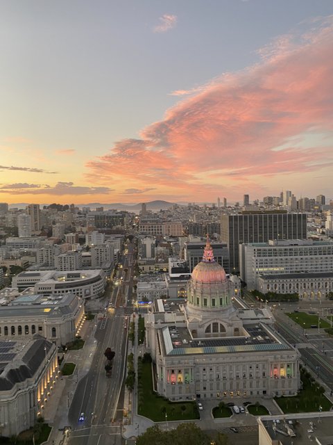 Pink Sky over San Francisco's Urban Landscape
