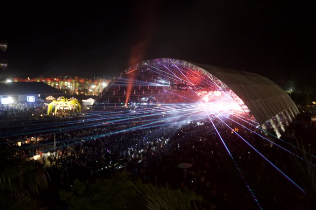 Night Sky Flare: Massive Crowd at Coachella Concert