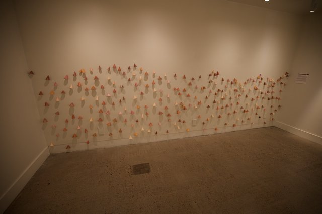 Contemporary Art Installation with Folded Paper Triangles