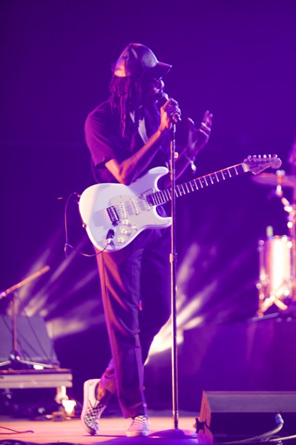 Rocking the Stage with Dreads and Guitar