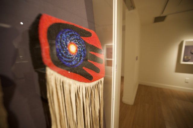 Contemporary Indigenous Textile Art with Spiral Galaxy Motif