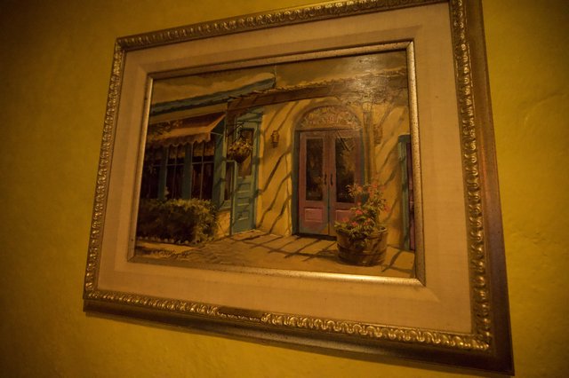 Framed Painting of Southwestern Courtyard with Blue Door