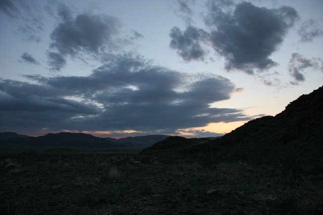 Desert Sunset under the Mysterious Clouds
