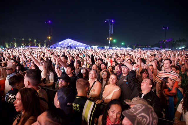 Vibrant Nights at Coachella 2024: A Crowd Engulfed in Music
