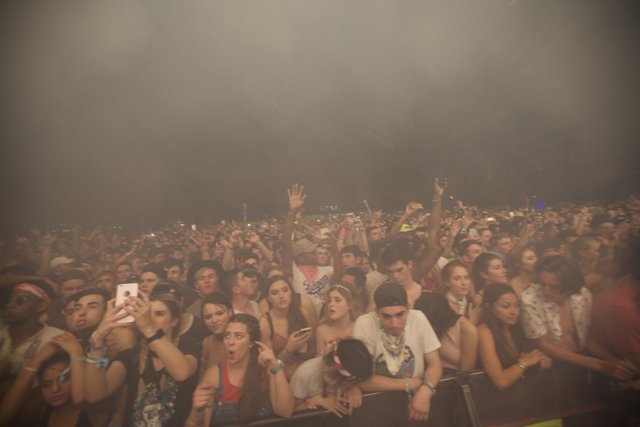 Smoke-filled Concert Crowd