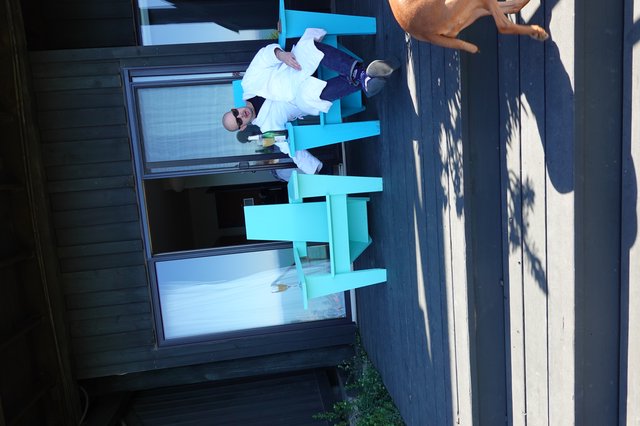 Relaxing on Modern Patio with Turquoise Furniture