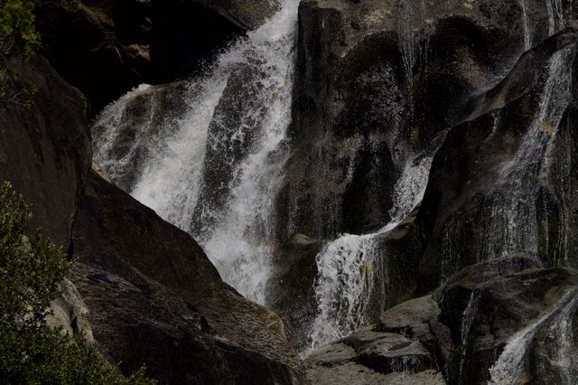 Rushing Waters Through Dark Granite Gorge