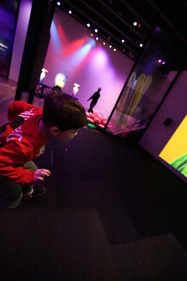 Child in Red Hoodie at Baby Rave Event