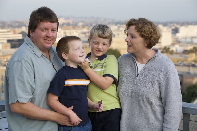 Family Portrait on City Overlook at Dusk