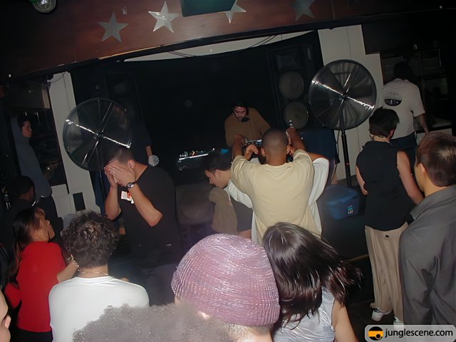 Nightclub Fun with DJ and Disco Ball