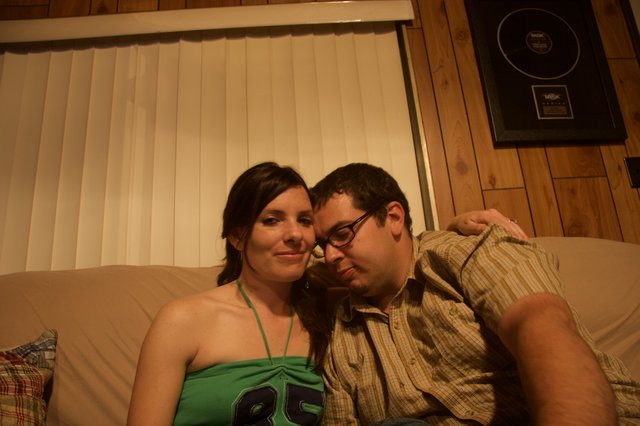 Couple Relaxing Together on Couch at Home