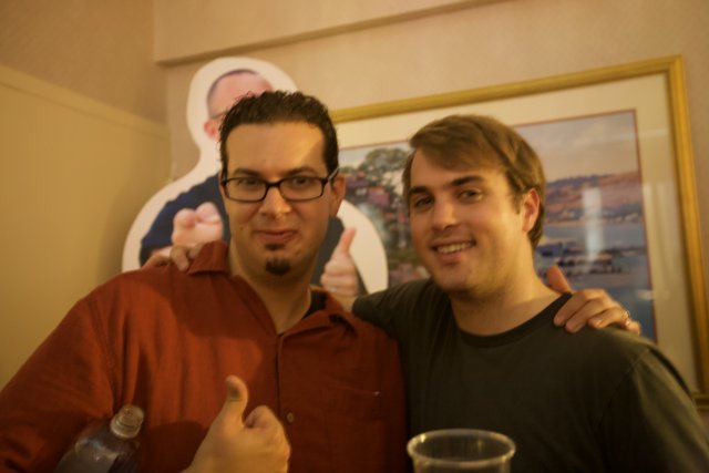 Two Men Enjoying Drinks at Defcon