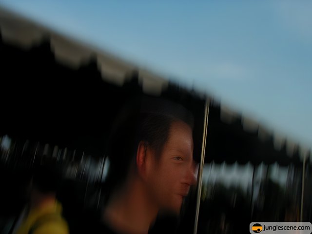 Blurry Silhouette of a Man in Front of a Tent