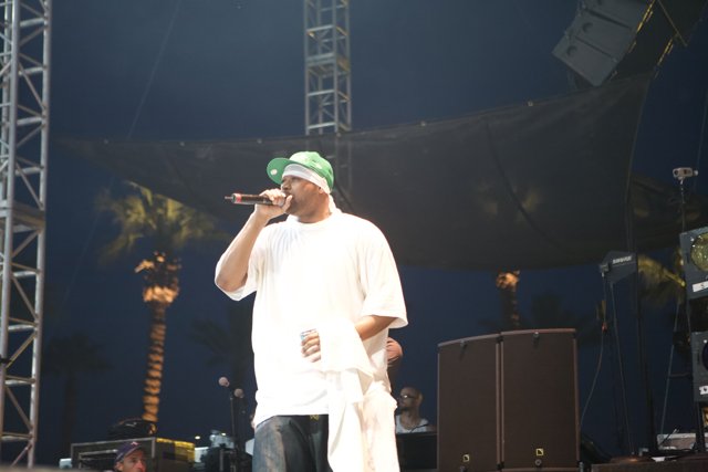 On Stage at Coachella: Green Hat and White Shirt