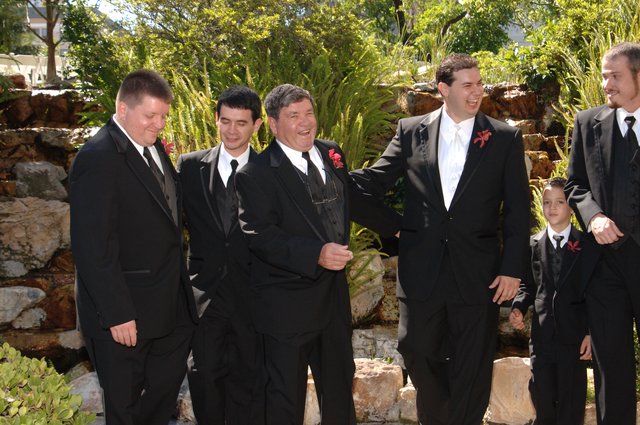 Groomsmen Share Laughter Before Wedding Ceremony