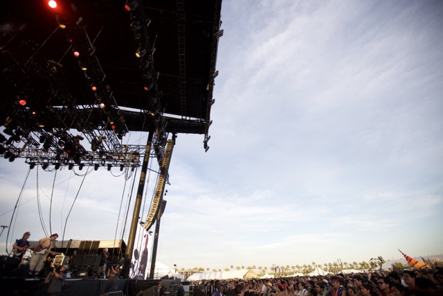 Coachella Crowd Rocking Out Under Spotlight