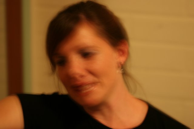 Candid Moment: Woman in Warm Indoor Light