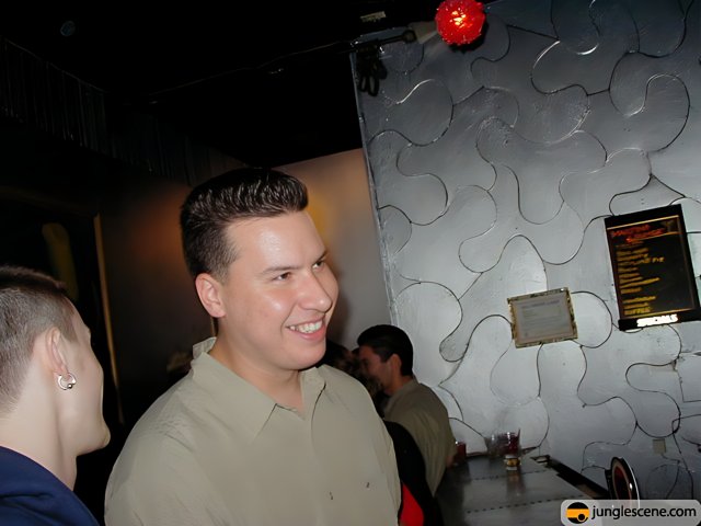 Smiling Man at Nightclub Party