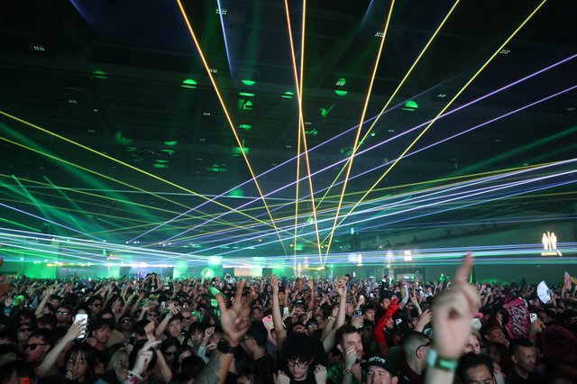 Laser Light Storm Over Massive EDM Festival Crowd