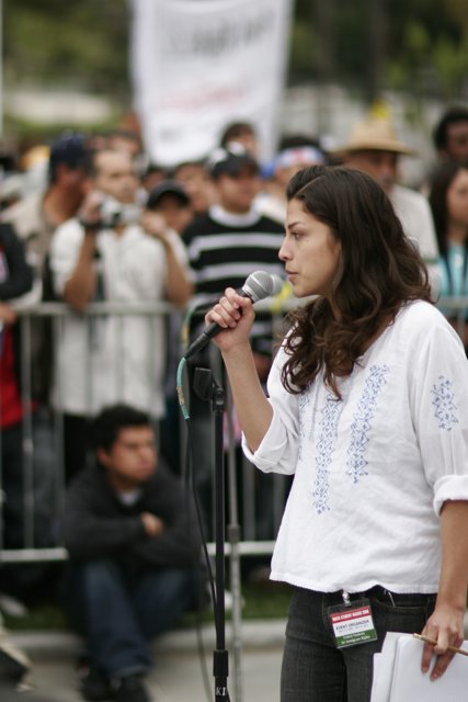 Speaking Out: A Woman and Her Microphone