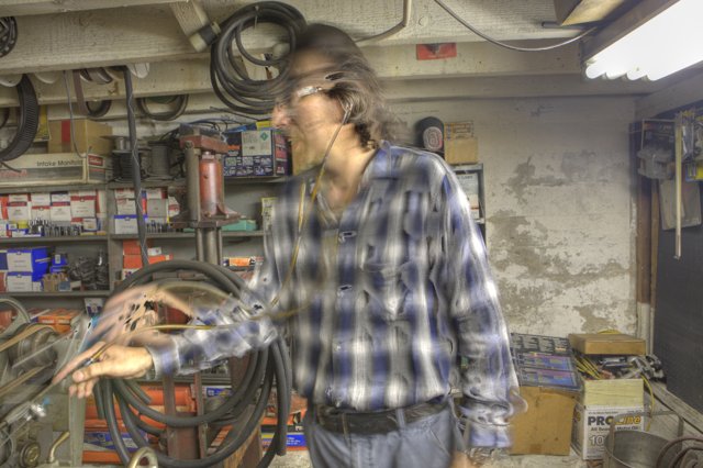 Man at Work in a Factory Garage