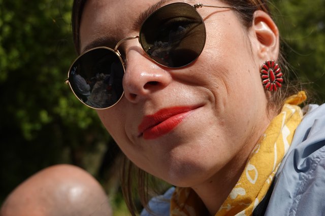 Summer Portrait with Round Sunglasses and Red Lipstick