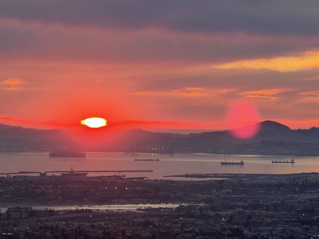 Vibrant Sunset Over San Francisco Bay with Ships