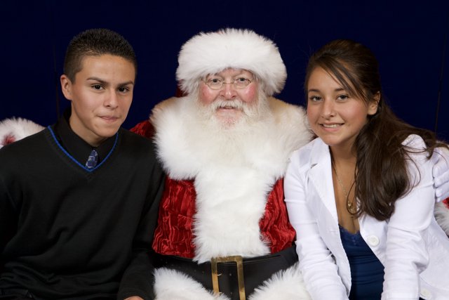 Jolly Santa with Young Couple
