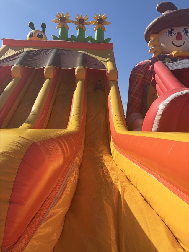 Towering Inflatable Slide at Outdoor Festival