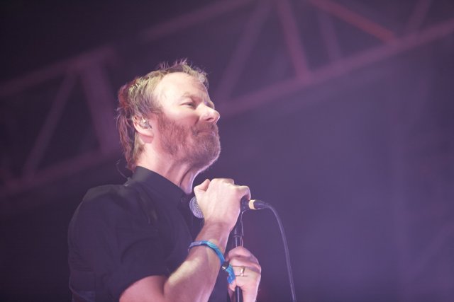Matt Berninger Shreds it on Stage with Microphone in Hand