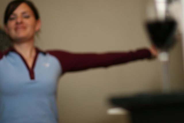 Woman Reaches Out with a Playful Smile