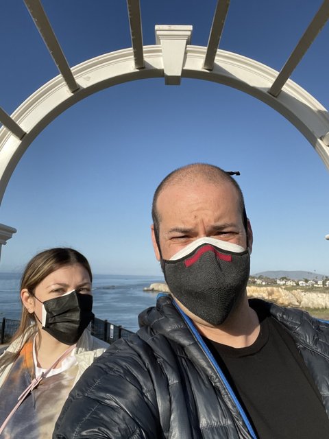 Masked Couple on Pismo Beach Bridge