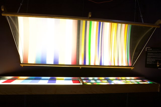 Multi-Colored Light Fixture Illuminates Indoors