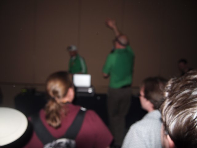 Man in Green Shirt Enjoys Company