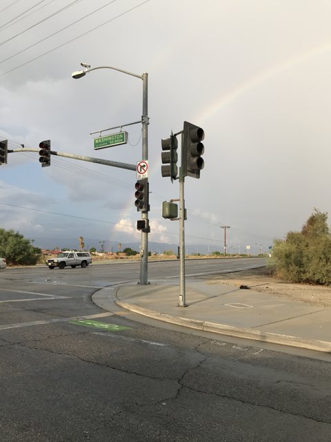 Rainbow over an Urban Intersection