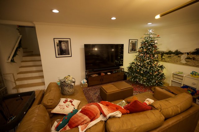 Cozy Christmas Living Room with Decorated Tree