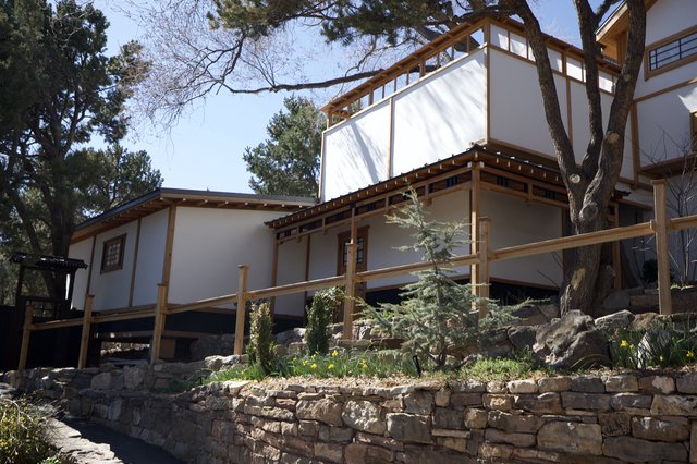 Modern Adobe-Style Home with Asian-Inspired Architecture
