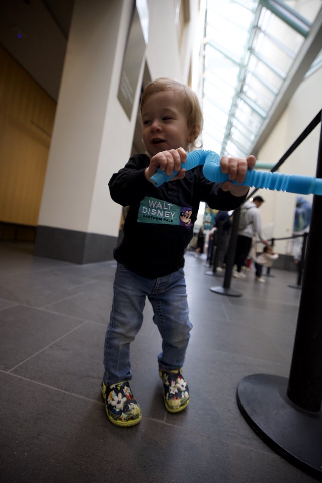 Toddler Playing at Baby Rave Event in Museum