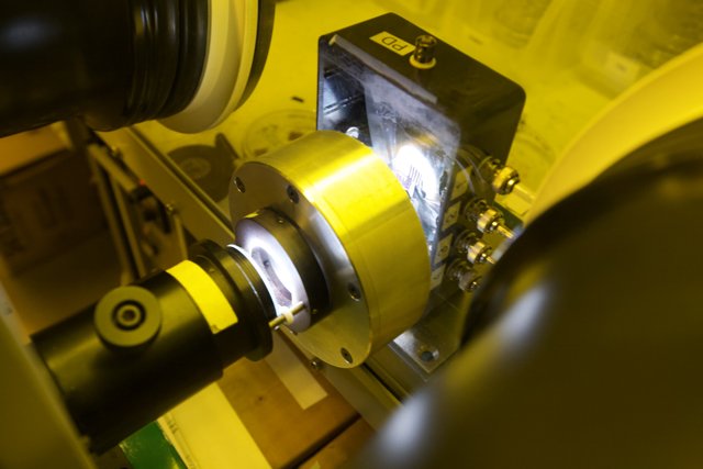 Making Light with a Precision Machine