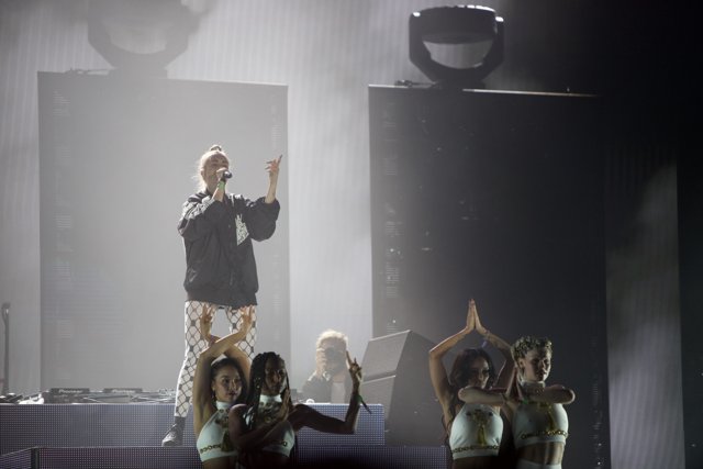 Man on Stage with Dancers at Coachella