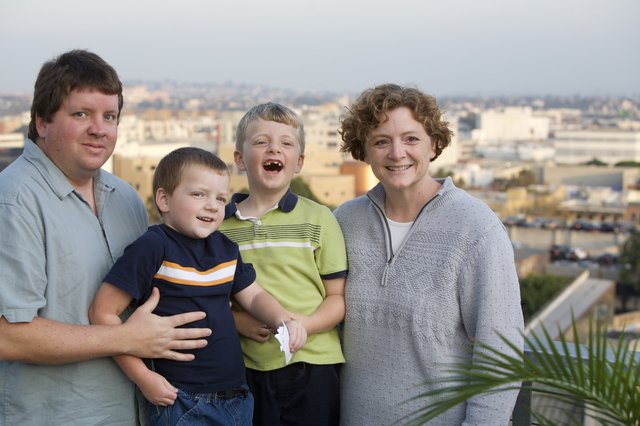Family Portrait on Urban Rooftop at Dusk